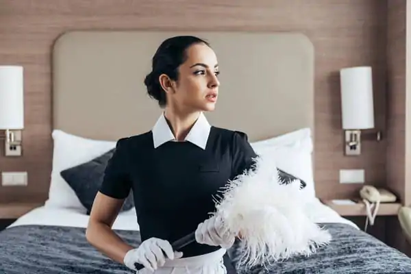 depositphotos_277798238-stock-photo-pensive-brunette-maid-apron-gloves-1 (1)